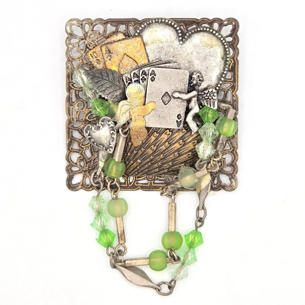 Mixed Metal Assemblage Brooch Cherub Heart Playing Cards Green Glass Bead Dangle